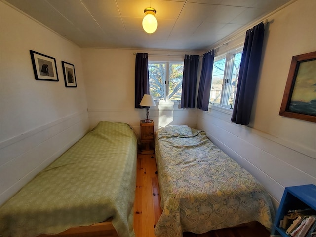 bedroom featuring wood-type flooring