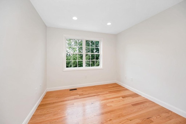 empty room with light wood-type flooring