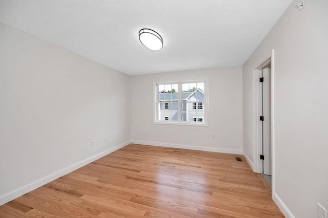 empty room with light wood-type flooring