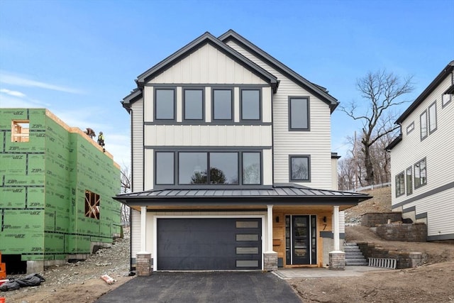 545 Winthrop St Lot 4, Medford, MA 02155 - view of front of house featuring a standing seam roof, metal roof, and driveway
