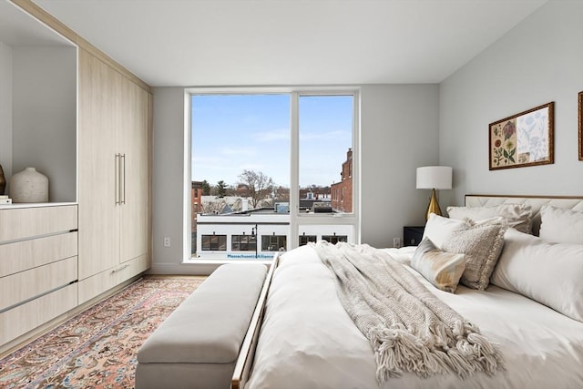 bedroom featuring expansive windows