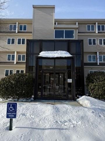 view of snow covered building