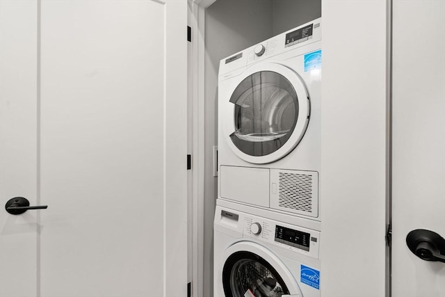 10 Somerset Unit 201, Winthrop, MA 02152 - laundry room featuring stacked washer / dryer