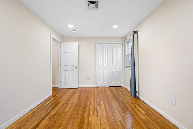 unfurnished bedroom with light hardwood / wood-style flooring