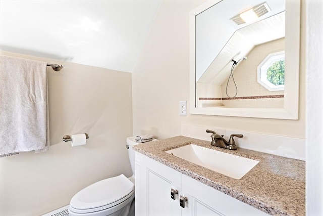 17 S High St, Ashburnham, MA 01430 - bathroom with vanity, toilet, a baseboard radiator, and vaulted ceiling