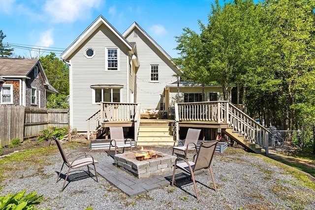 17 S High St, Ashburnham, MA 01430 - rear view of house featuring stairway, a fire pit, a wooden deck, and a patio area