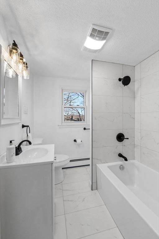 full bathroom featuring vanity, tiled shower / bath combo, toilet, a textured ceiling, and baseboard heating