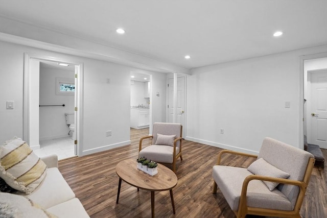 living room with dark hardwood / wood-style floors