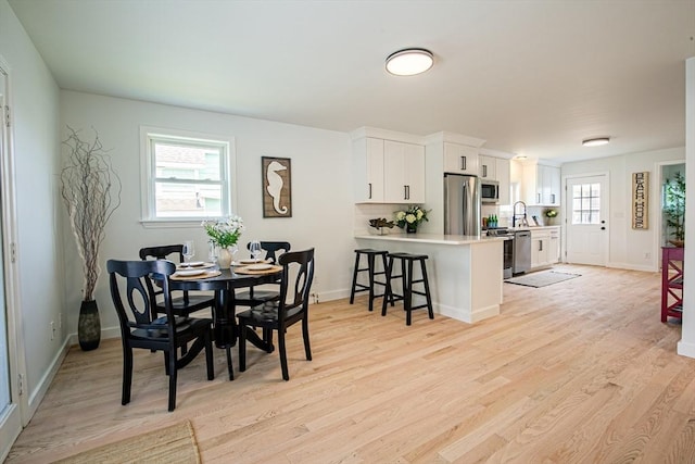 401 N End Blvd, Salisbury, MA 01952 - dining room featuring light wood finished floors and baseboards
