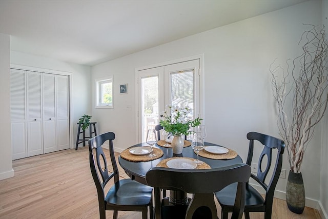 401 N End Blvd, Salisbury, MA 01952 - dining room featuring light wood-style floors and baseboards