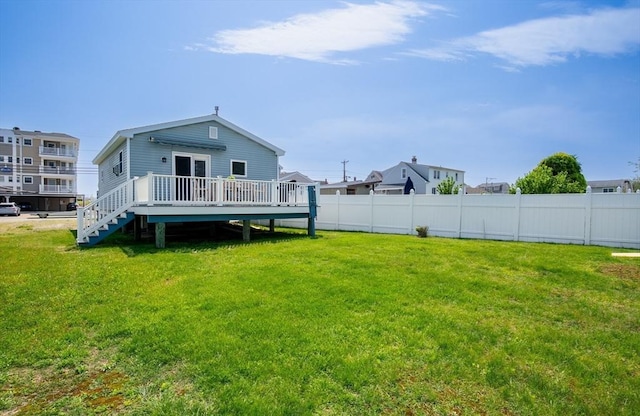 401 N End Blvd, Salisbury, MA 01952 - back of property with a deck and stairs