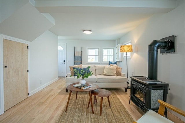 401 N End Blvd, Salisbury, MA 01952 - living area with light wood-type flooring and a wood stove