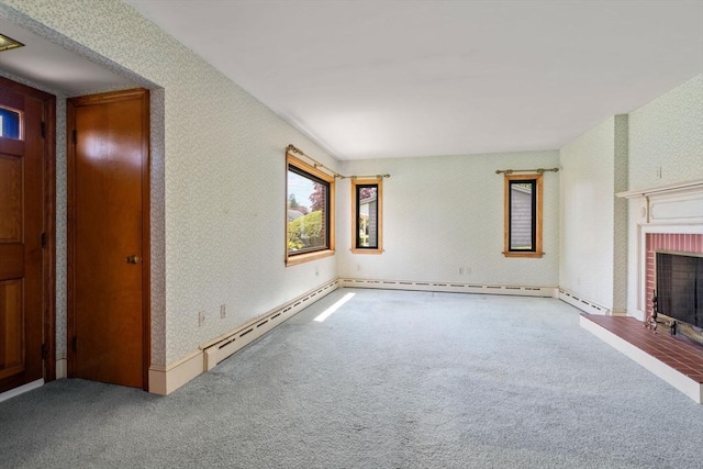 unfurnished living room featuring carpet flooring, a brick fireplace, and baseboards