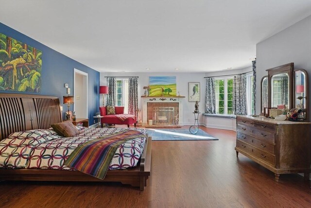 12 Vose Hill Rd, Westford, MA 01886 - bedroom with wood finished floors, multiple windows, and baseboards