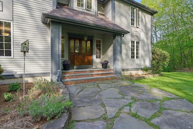 12 Vose Hill Rd, Westford, MA 01886 - entrance to property with a porch and a lawn