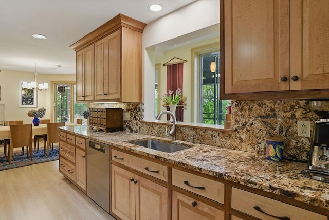 12 Vose Hill Rd, Westford, MA 01886 - kitchen with a sink, dishwasher, decorative backsplash, a chandelier, and light wood finished floors
