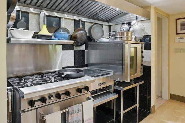 12 Vose Hill Rd, Westford, MA 01886 - kitchen view of tasteful backsplash and wall chimney range hood