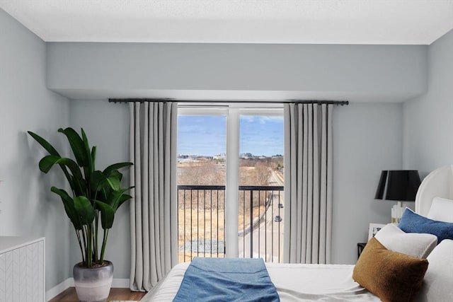 133 Commander Shea Blvd Unit 713, Quincy, MA 02171 - bedroom featuring wood finished floors and baseboards