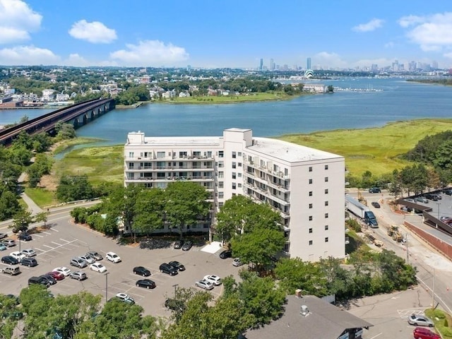 133 Commander Shea Blvd Unit 713, Quincy, MA 02171 - aerial view of a nearby body of water, city skyline, a notable bridge, and apartment complex / building