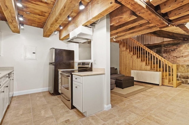 kitchen with white cabinets, stainless steel appliances, beamed ceiling, and light countertops