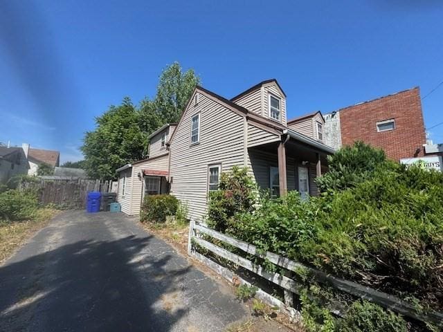 1002 Charles St, North Providence, RI 02904 - view of home's exterior featuring driveway
