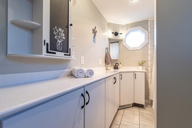 bathroom featuring vanity and tile patterned floors