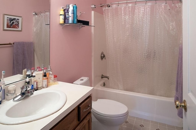 full bathroom with vanity, toilet, and shower / tub combo with curtain