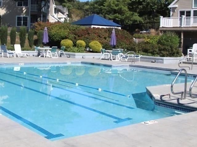 community pool featuring a patio