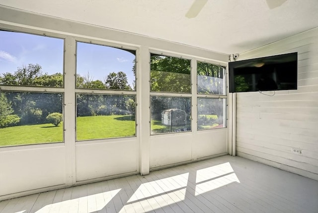 1112 Highland St, Holliston, MA 01746 - unfurnished sunroom featuring a ceiling fan