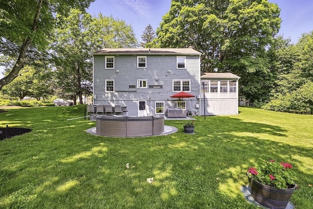 1112 Highland St, Holliston, MA 01746 - back of house featuring a yard and a sunroom