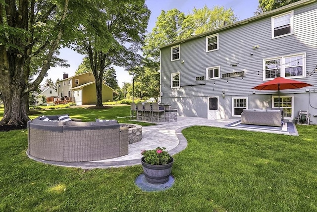 1112 Highland St, Holliston, MA 01746 - back of house featuring an outdoor hangout area, a patio area, and a yard
