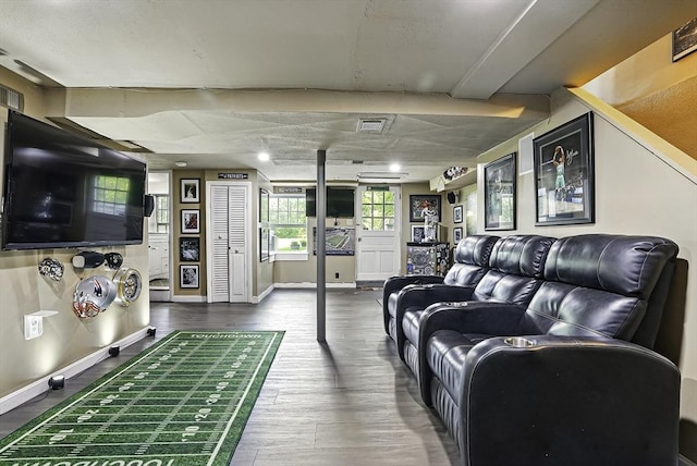 1112 Highland St, Holliston, MA 01746 - living area featuring dark wood-style floors and baseboards
