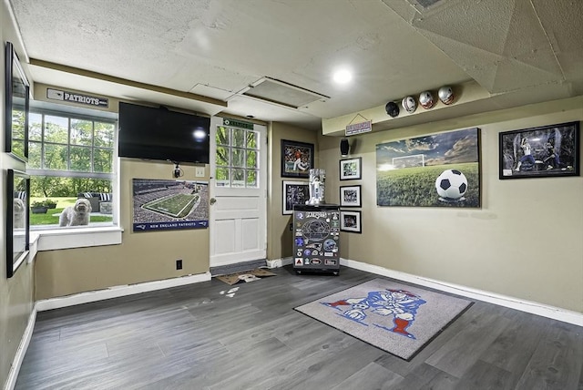 1112 Highland St, Holliston, MA 01746 - workout area with baseboards and wood finished floors