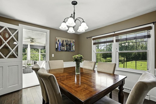 1112 Highland St, Holliston, MA 01746 - dining space with a ceiling fan, a chandelier, and wood finished floors