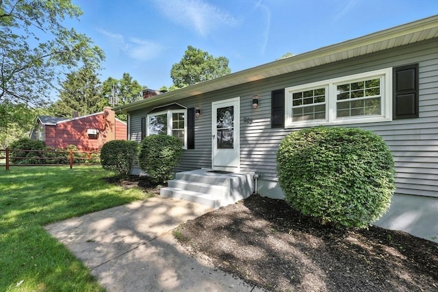 908 Tinkham Rd, Wilbraham, MA 01095 - property entrance with a chimney
