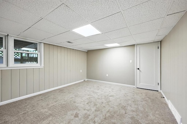 908 Tinkham Rd, Wilbraham, MA 01095 - carpeted spare room with a paneled ceiling and wooden walls