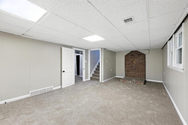 908 Tinkham Rd, Wilbraham, MA 01095 - finished basement featuring stairs, a paneled ceiling, and carpet floors