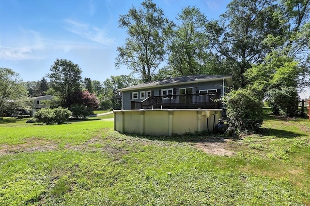 908 Tinkham Rd, Wilbraham, MA 01095 - view of green lawn with an outdoor pool and a deck