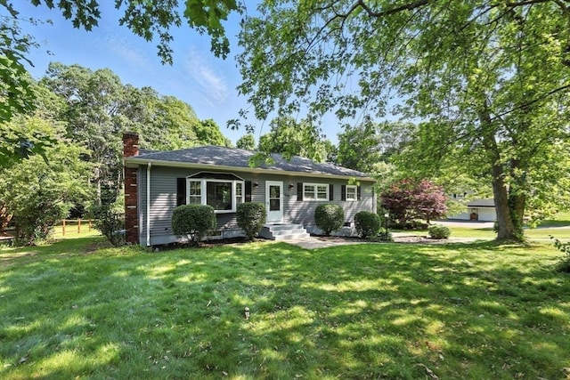 908 Tinkham Rd, Wilbraham, MA 01095 - view of front facade featuring a chimney