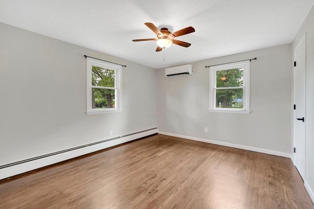 93 Pittroff Ave, South Hadley, MA 01075 - unfurnished room with a wall mounted AC, a baseboard radiator, wood finished floors, and ceiling fan