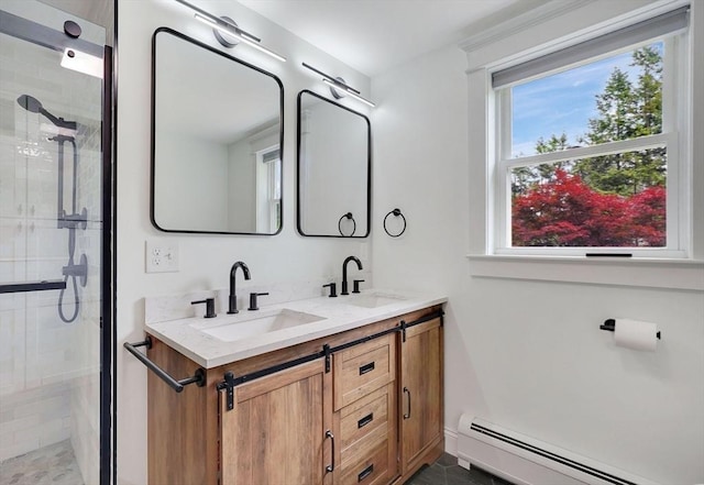 93 Pittroff Ave, South Hadley, MA 01075 - bathroom featuring a baseboard heating unit, a shower stall, and double vanity