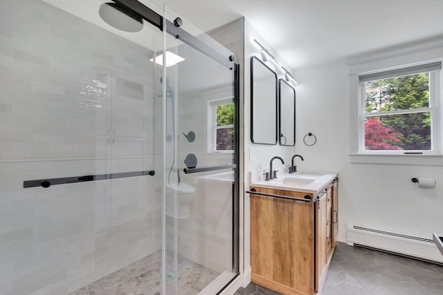 93 Pittroff Ave, South Hadley, MA 01075 - full bath with baseboard heating, healthy amount of natural light, vanity, and a shower stall