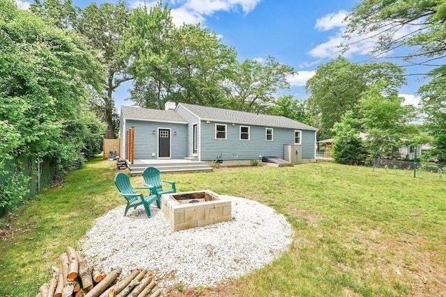 93 Pittroff Ave, South Hadley, MA 01075 - back of house with a fire pit and a fenced backyard