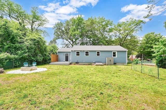93 Pittroff Ave, South Hadley, MA 01075 - back of property with a fire pit, a fenced backyard, and a wooden deck