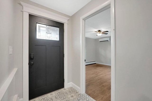 93 Pittroff Ave, South Hadley, MA 01075 - foyer entrance featuring a baseboard heating unit, an AC wall unit, and ceiling fan