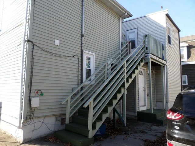 57 Bloomingdale St, Chelsea, MA 02150 - rear view of house featuring entry steps