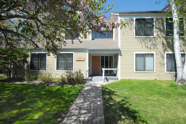 view of front facade with a front lawn