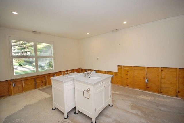 office space with a sink, ornamental molding, light carpet, and recessed lighting