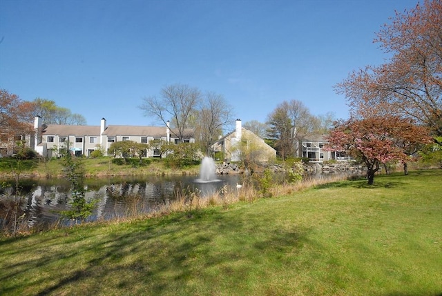 view of yard with a water view