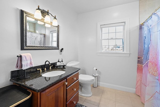 full bathroom featuring tile patterned floors, baseboards, toilet, and vanity